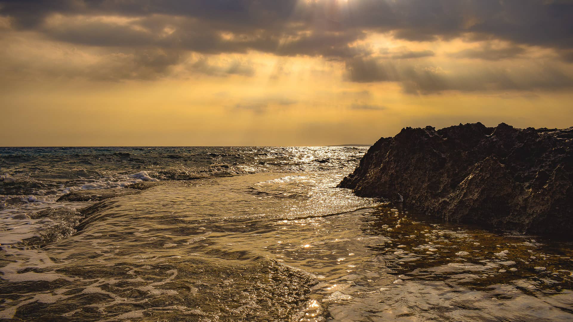 sunset rock sea water horizon  