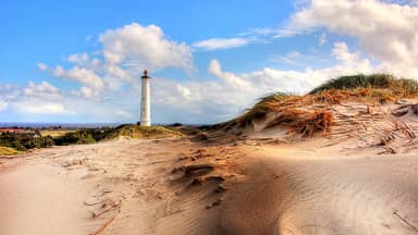 lighthouse beach sea coast ocean  