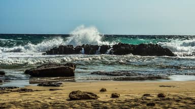 rocky coast wave smashing sea  